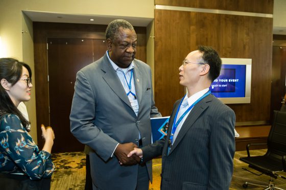 Attendees Shake Hands at the 2018 Annual Conference